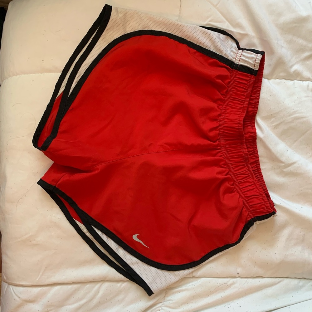 Red Nike running shorts